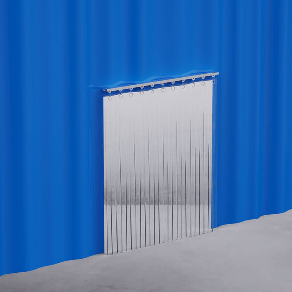 Strip curtain door set into a curtain wall